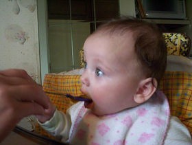 baby-eating-homemade-baby-food-by-MamaT.jpg