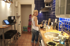 girl-using-computer-in-the-kitchen-for-recipes-by-Rsms.jpg