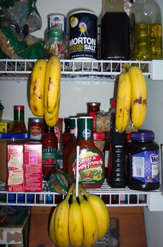 A banana stand made out of the closet shelves in the pantry.