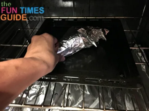 Here you can see that the entire cone and filling is wrapped in a piece of aluminum foil before placing it in the oven. 