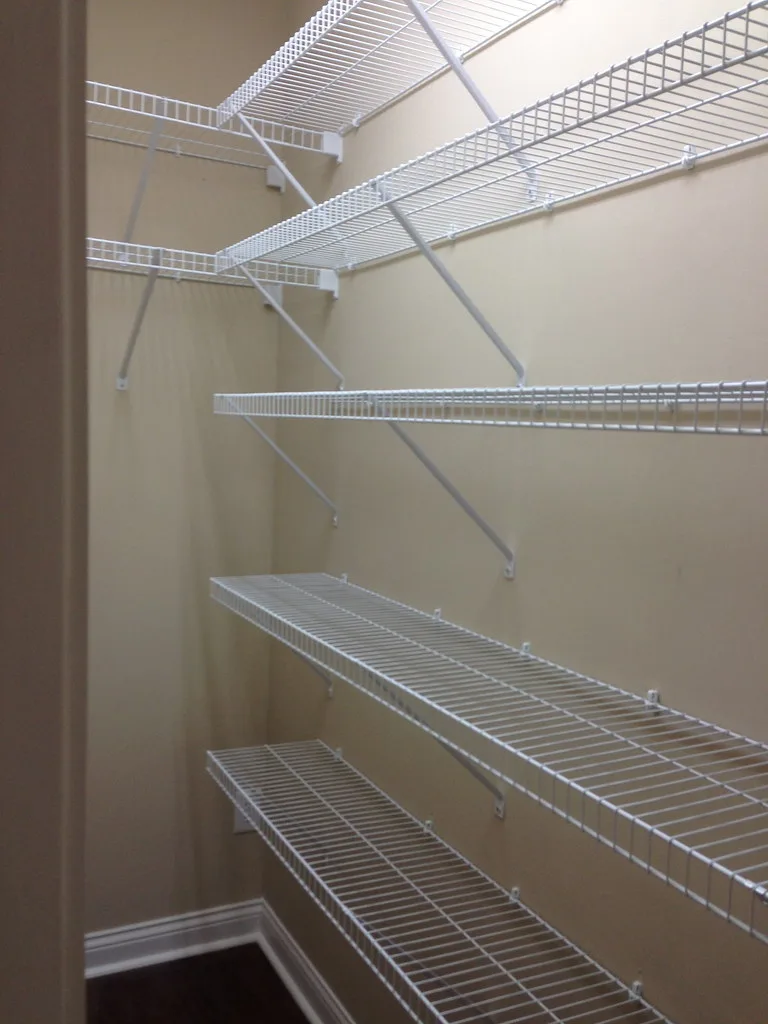 There's nothing like a fresh, clean (empty!) kitchen pantry - just waiting to be filled and organized!