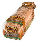 Nature's Own Honey 7 Grain whole wheat bread loaf.